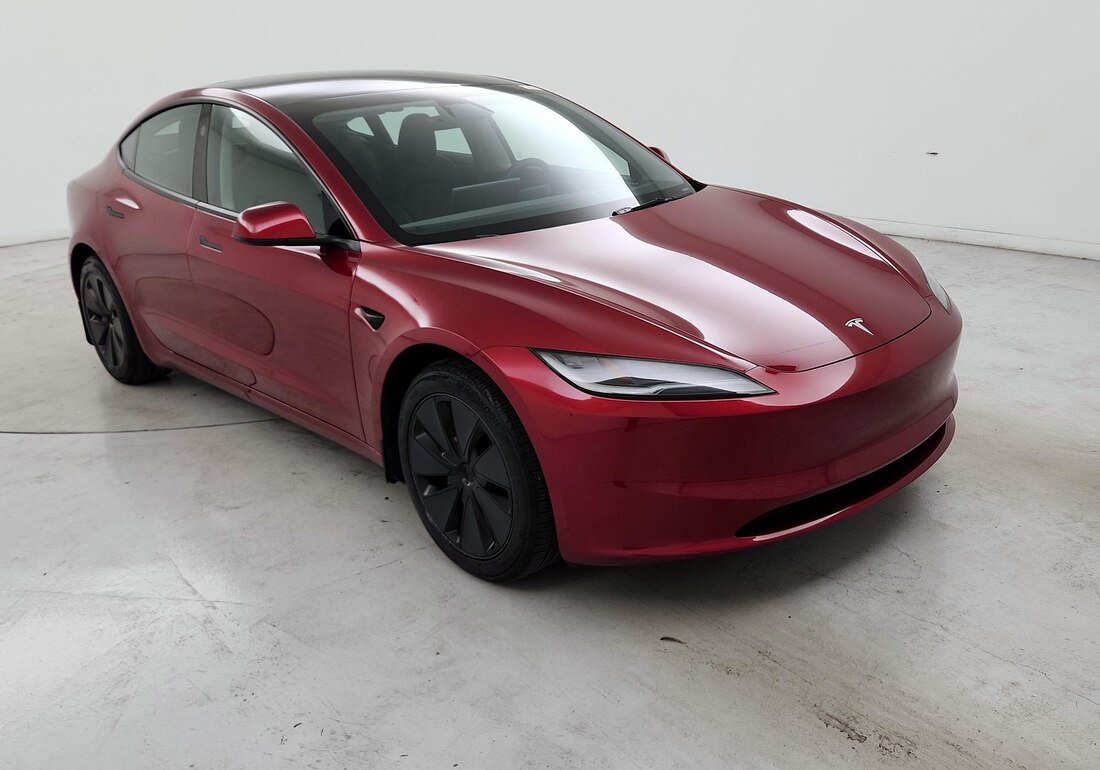 2025 Tesla Model 3 Long Range Rear-Wheel Drive in Red — CarMax photo