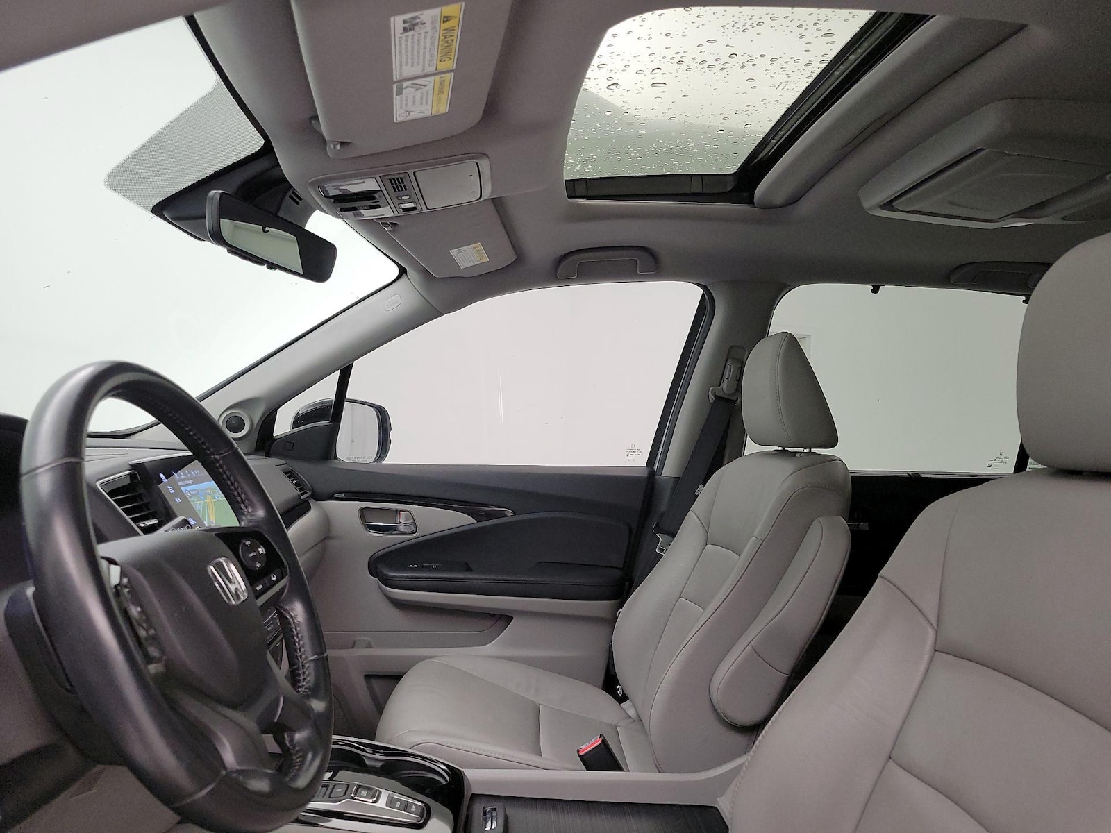 Sunroof(s) & Overhead Airbags