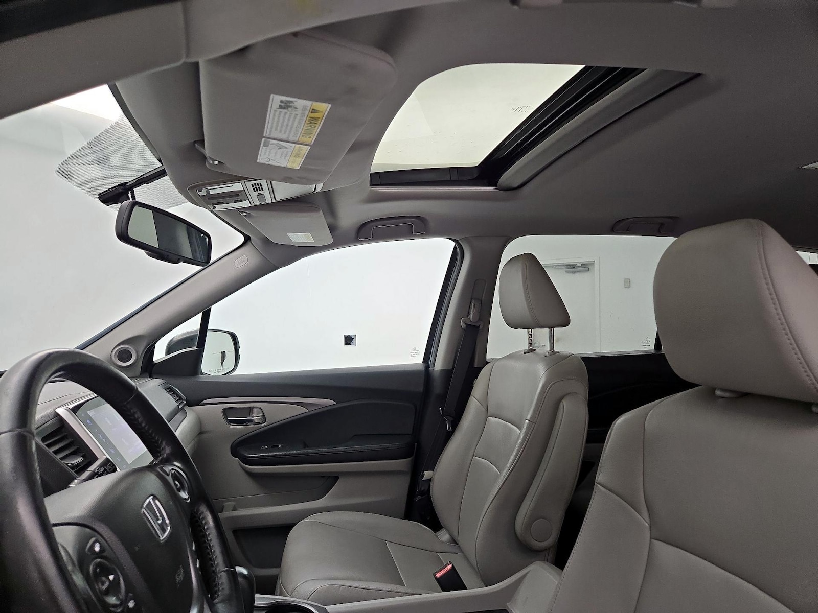 Sunroof(s) & Overhead Airbags