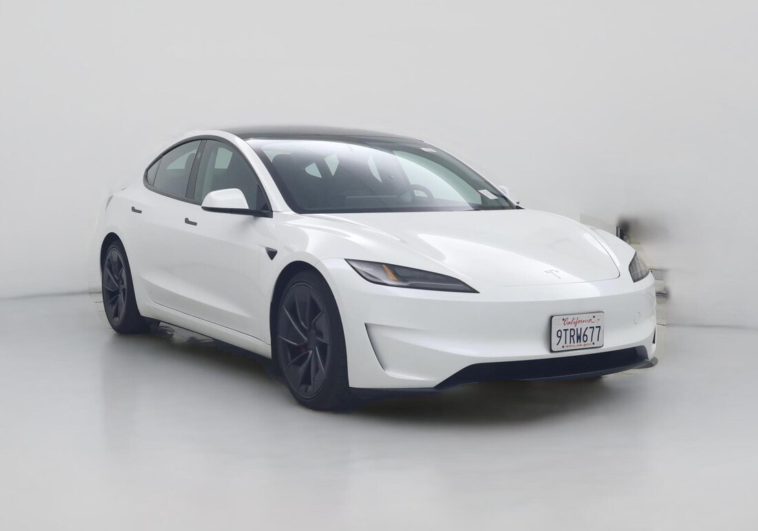 2025 Tesla Model 3 Performance All-Wheel Drive in White — CarMax photo