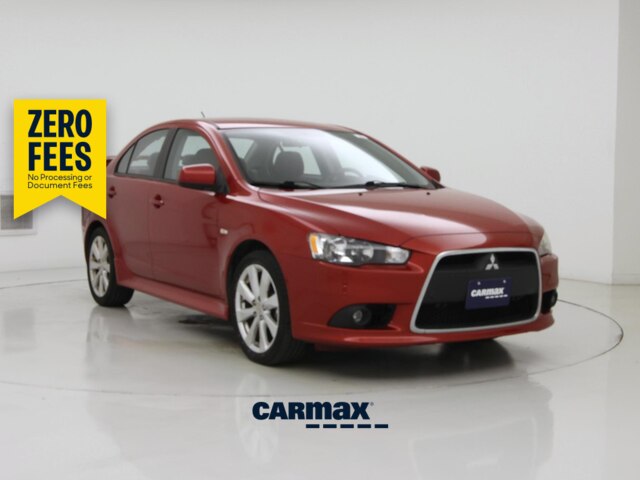 Red 2014 Mitsubishi Lancer Sedan Front-Wheel Drive Automatic
