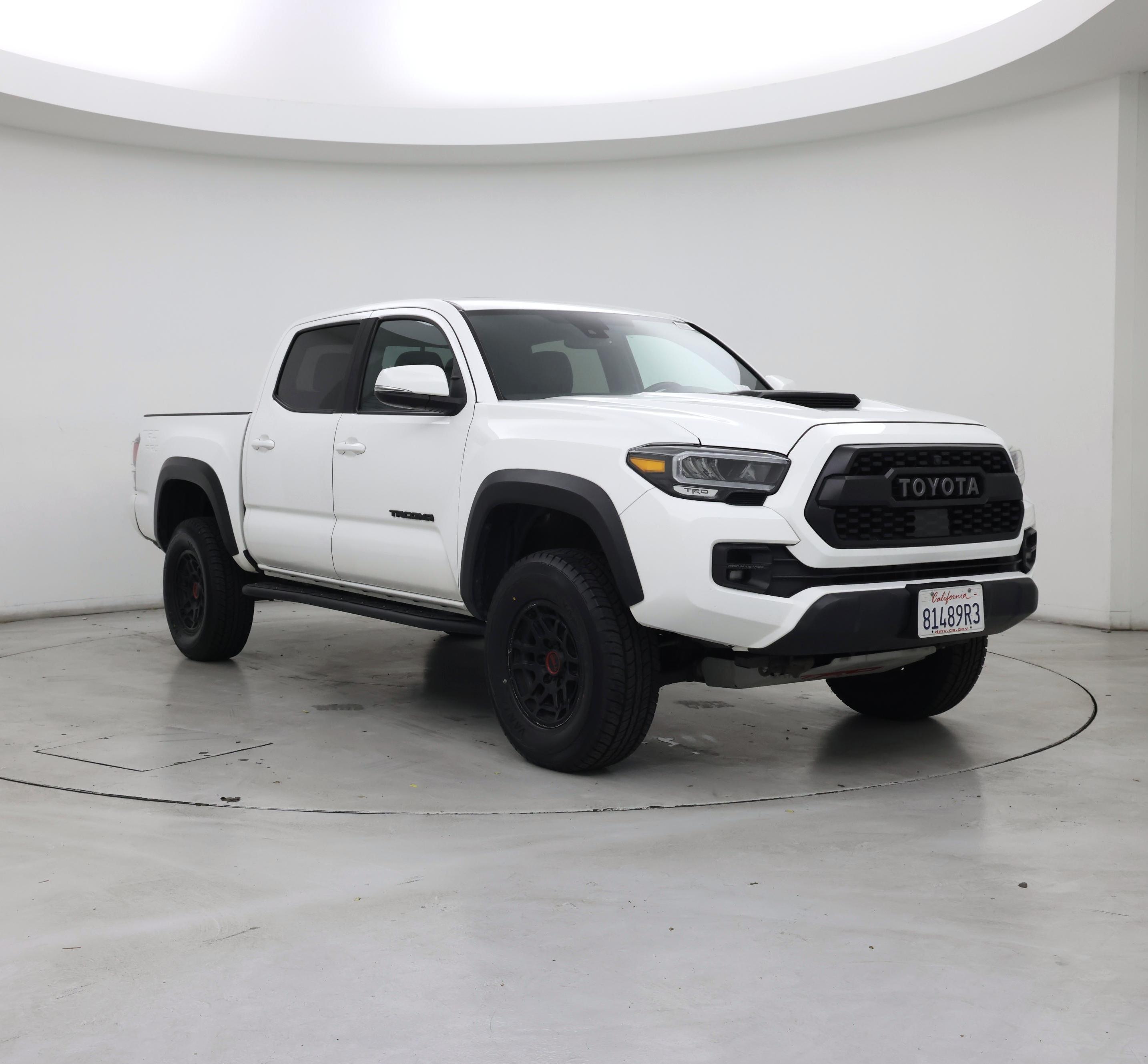 White 2023 Toyota Tacoma Pickup Truck Four-Wheel Drive Manual