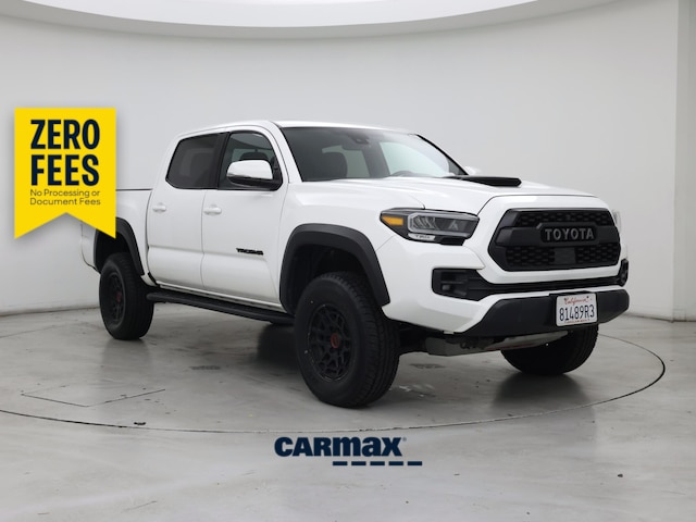 White 2023 Toyota Tacoma Pickup Truck Four-Wheel Drive Manual