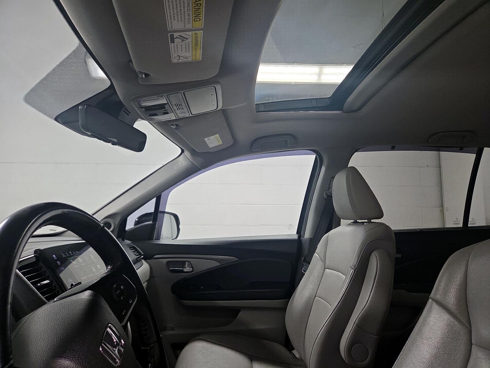Sunroof(s) & Overhead Airbags