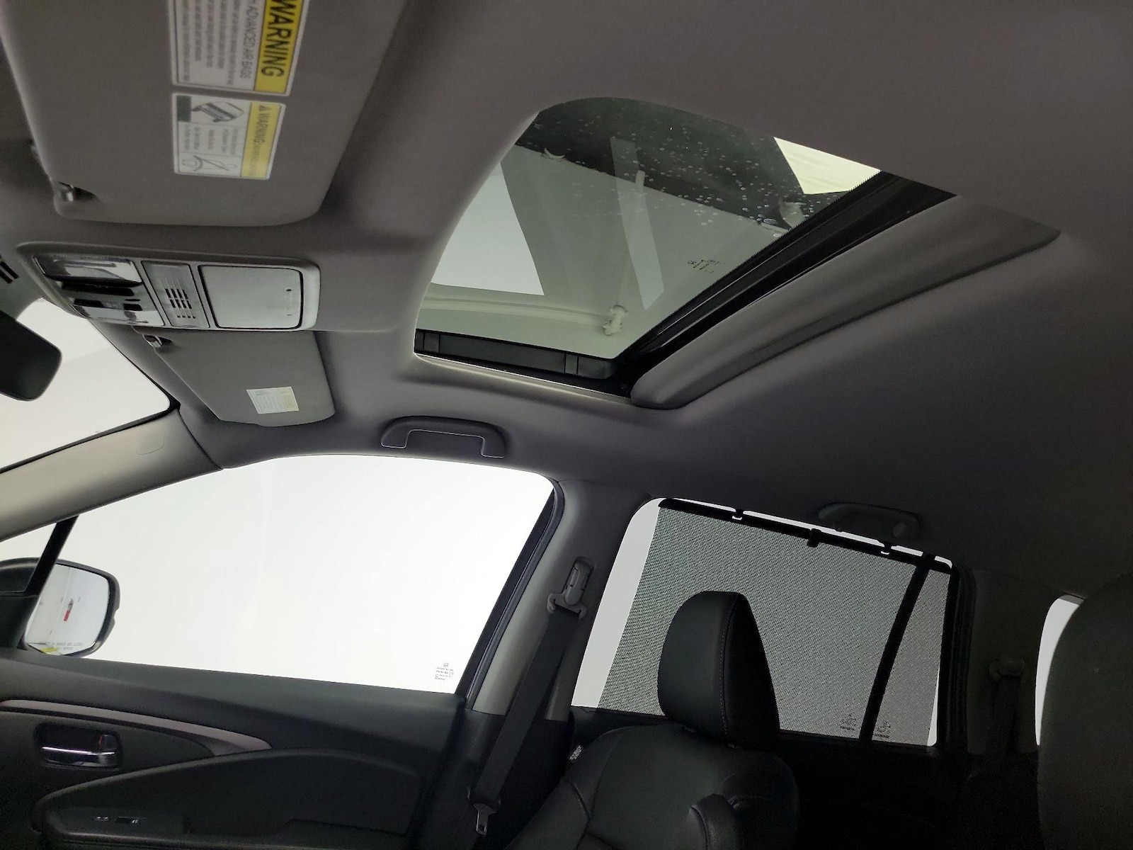 Sunroof(s) & Overhead Airbags