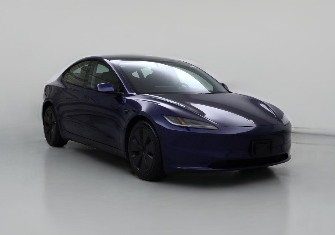 2025 Tesla Model 3 Long Range All-Wheel Drive in Blue — CarMax photo