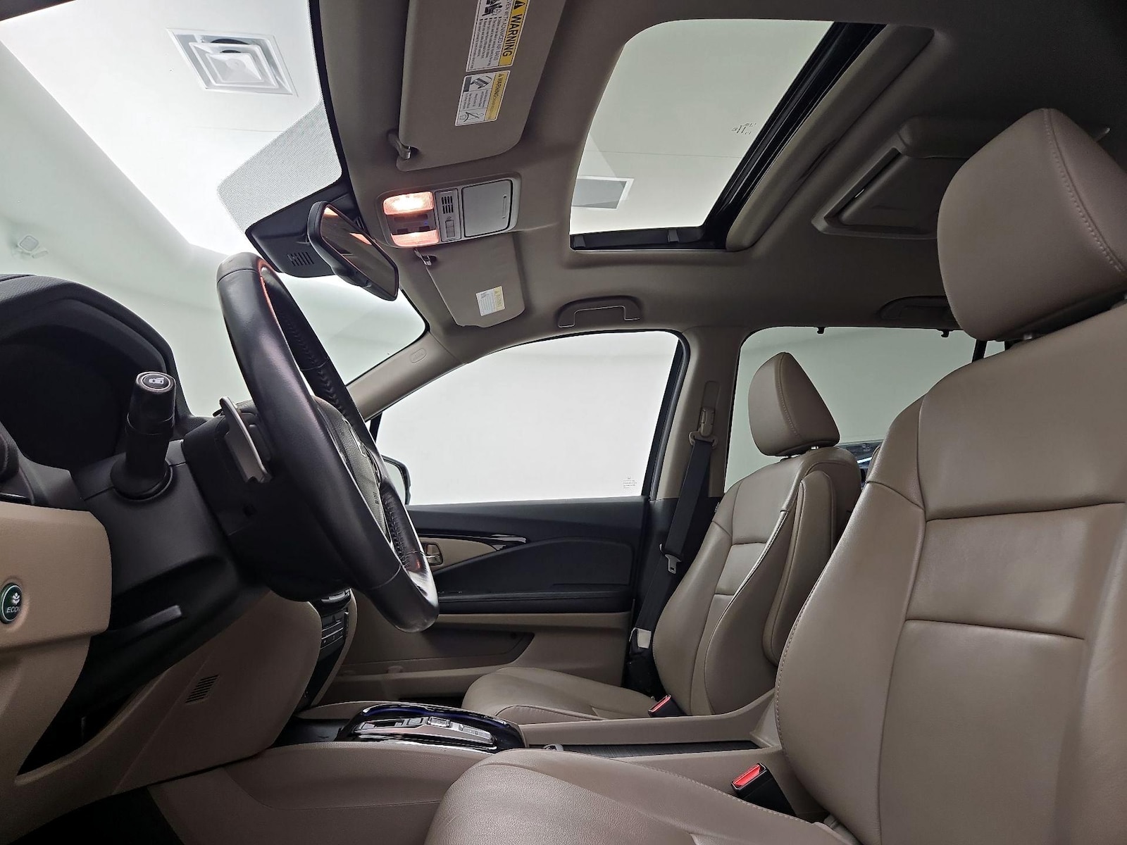 Sunroof(s) & Overhead Airbags