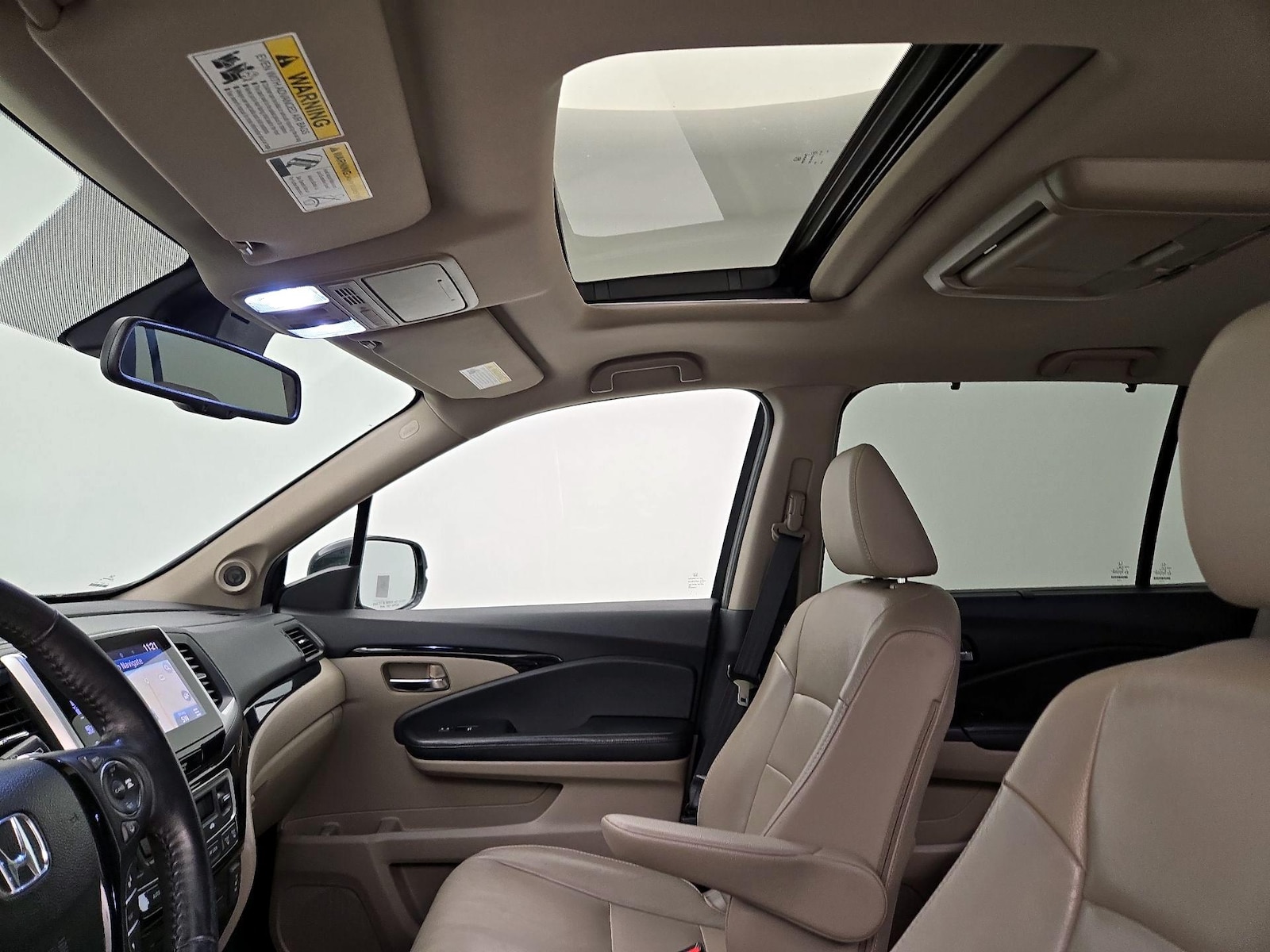 Sunroof(s) & Overhead Airbags