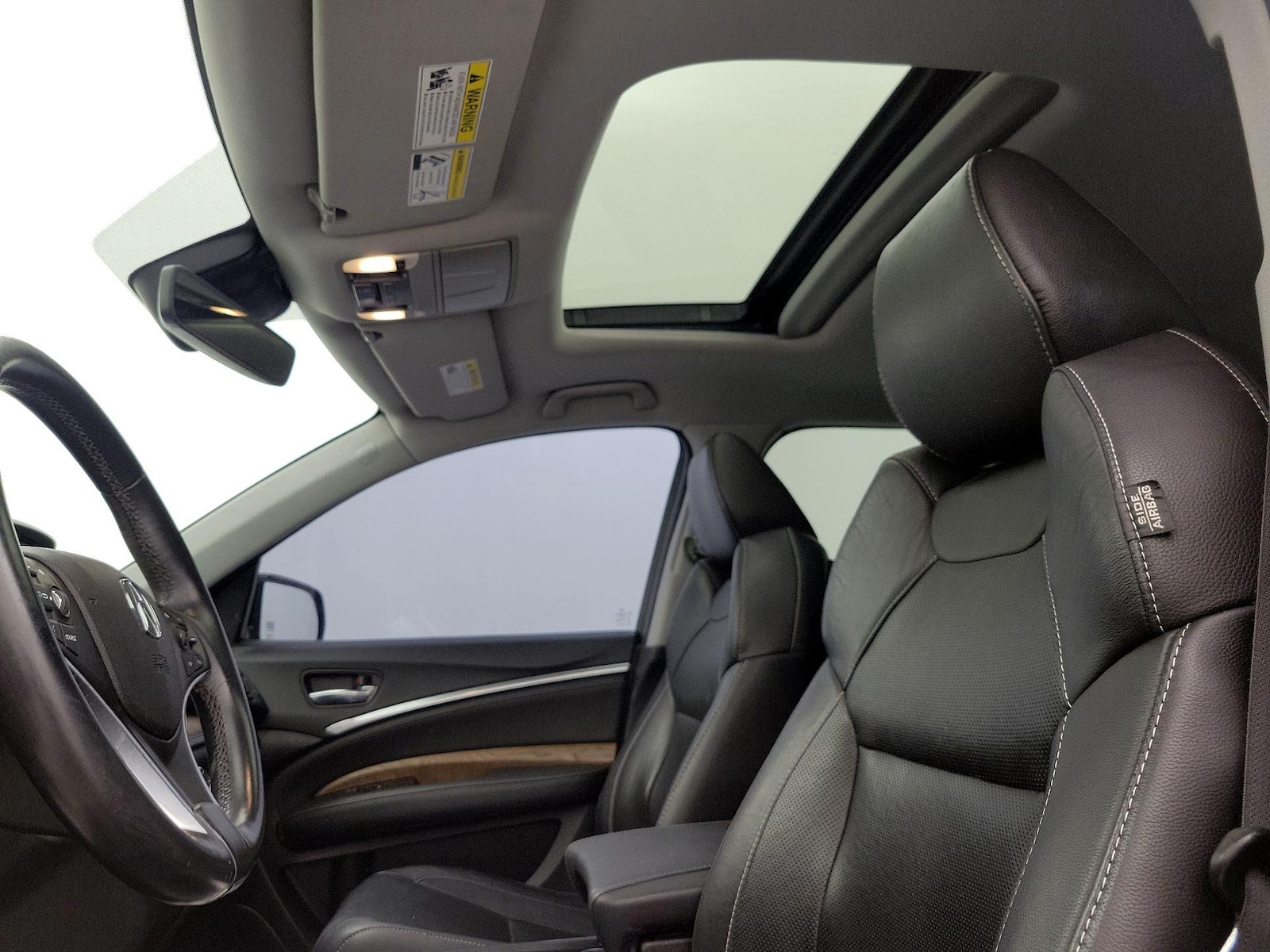 Sunroof(s) & Overhead Airbags