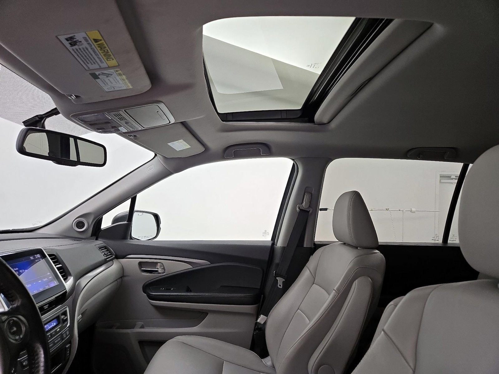 Sunroof(s) & Overhead Airbags