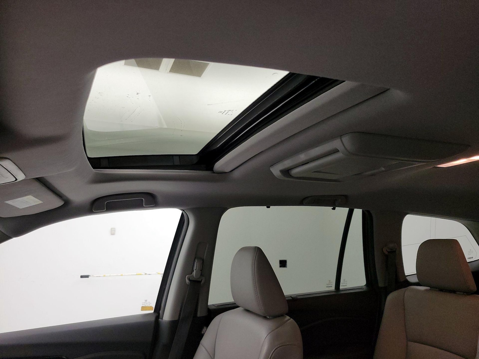 Sunroof(s) & Overhead Airbags