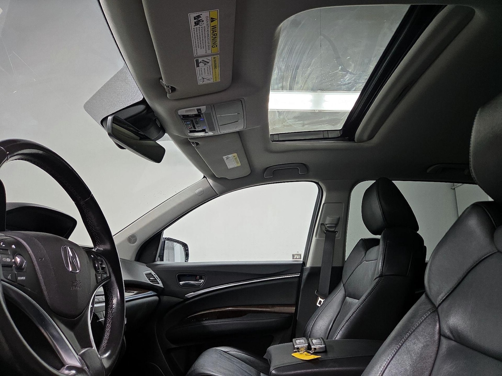 Sunroof(s) & Overhead Airbags