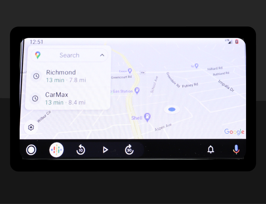 A series of screen shots of how the car display looks while using Android Auto. Two screenshots show the app overview screens and one shows Google Maps.